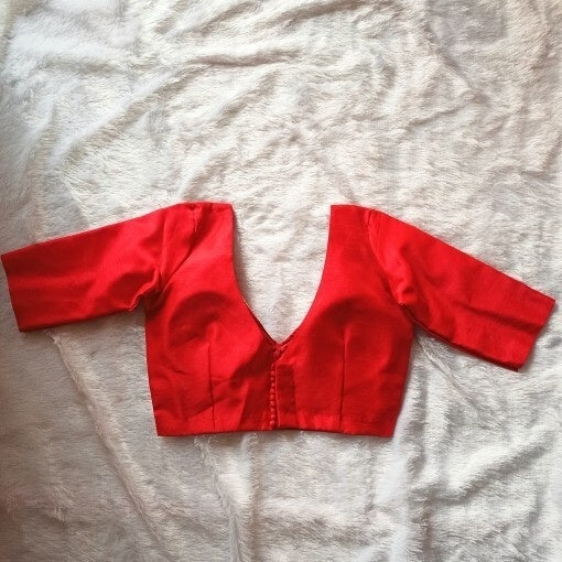 Red Deep V Neck and Back Potli Button Plain Raw Silk Blouse