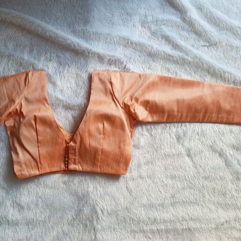 Peach Deep V Neck and Back Potli Button Full Sleeves Plain Raw Silk Blouse